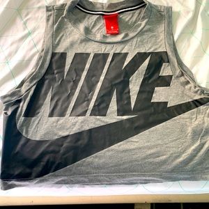 Women’s Nike Active wear grey crop top with black lettering. Size medium.